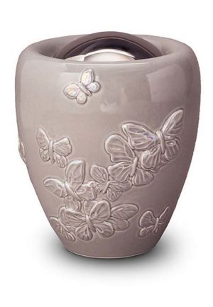 liels keramikas urnas tauriņš