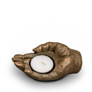 Keramisk mini konst urna liggande hand